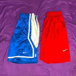Both of these Nike shirts cost 19, 20$ bucks. both of the shorts are size Medium